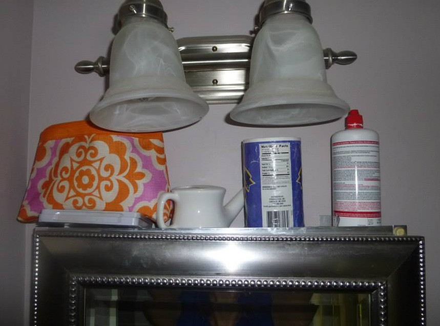 The clear valuables at the top--you know, make-up, neti-pot and the like...