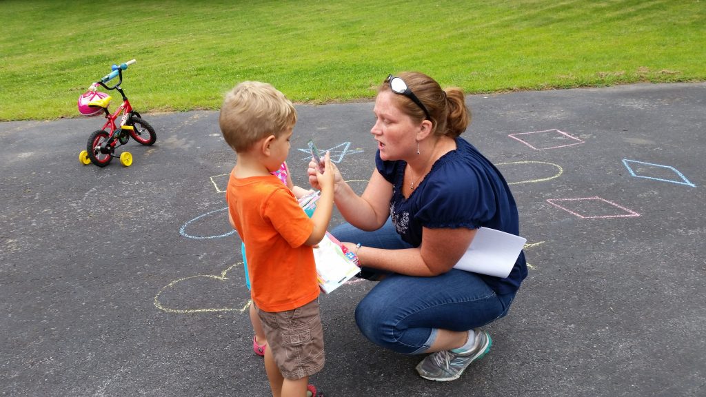 Physical therapist playing with kids @meredithspidel