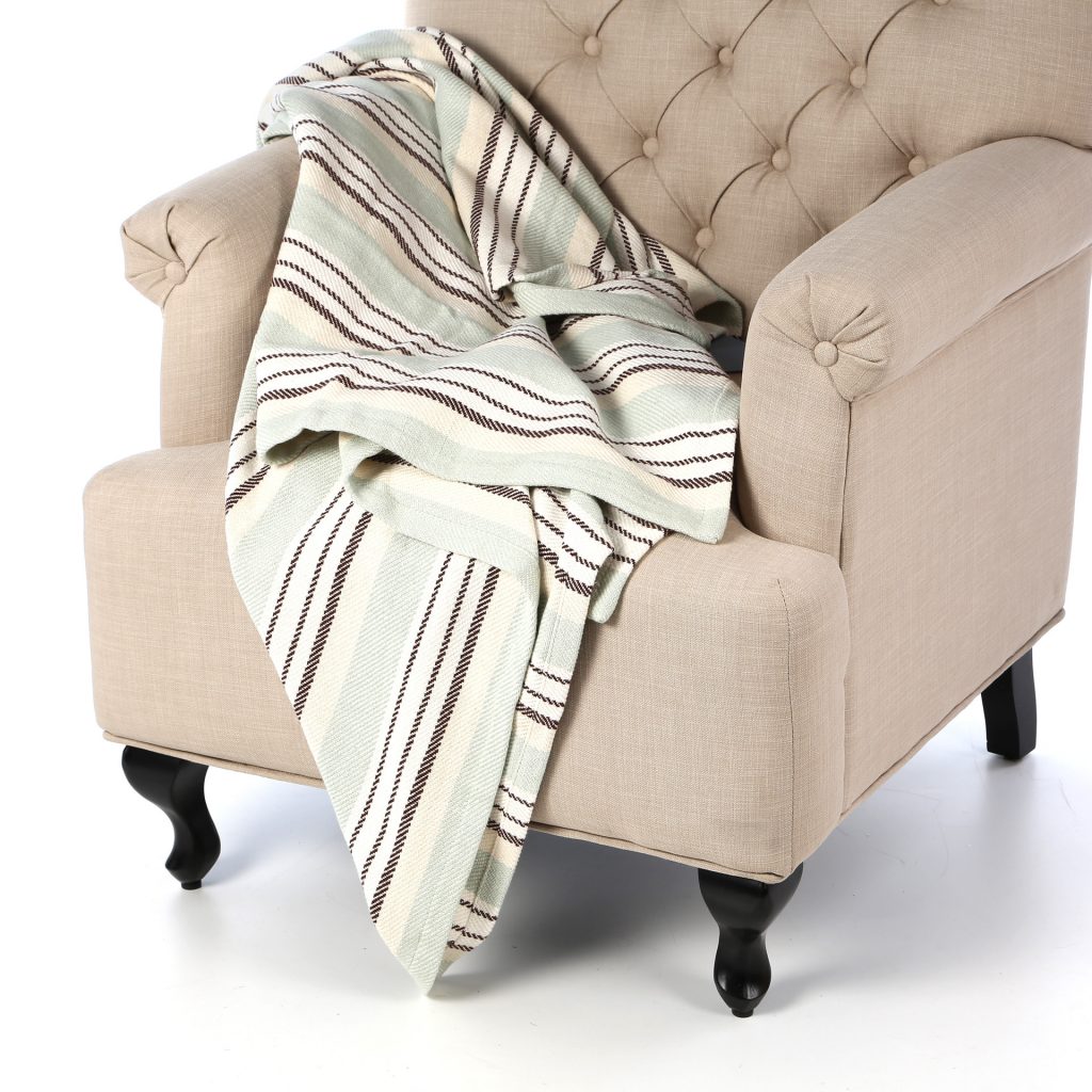 Looking for a soft touch of color to add to a chair or bed? This sweet woven cotton throw is a gentle accent.