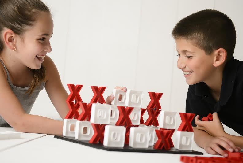 Tic Stac Toe is THE new game for kids of all ages! Snatch it up for Family Game Night, holiday gifts, and as a super learning tool for school-age children. Perfect way to keep kids busy in these long winter months or rainy days too! 