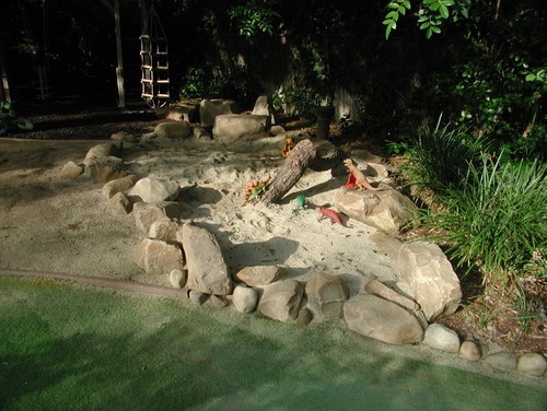 Bring the beach to your backyard by creating a sand pit. With buckets, shovels and other sand sidekicks, they can create to their hearts' content.
