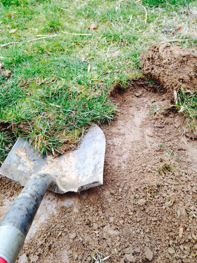 Wanting to build a raised garden bed for your home vegetable garden, but aren't sure where to start? Here is the easy step-by-by step how-to guide to build your own--the very cheap, economical way! Take an afternoon and get ready to dig into your own fresh, home-grown produce with these easy steps!