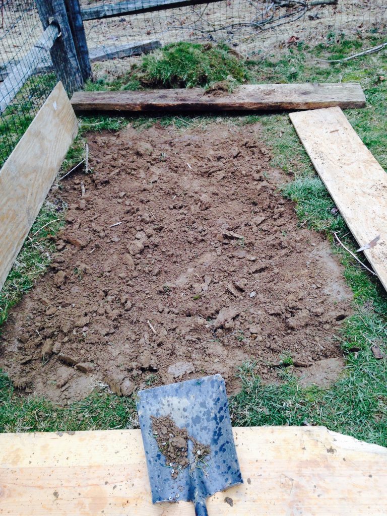 Wanting to build a raised garden bed for your home vegetable garden, but aren't sure where to start? Here is the easy step-by-by step how-to guide to build your own--the very cheap, economical way! Take an afternoon and get ready to dig into your own fresh, home-grown produce with these easy steps!