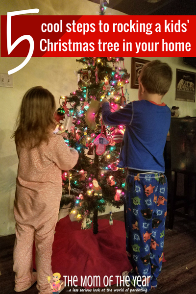 Putting up a kids' Christmas tree is one of the best holiday decorating traditions we have! Our whole family loves this special way to celebrate the Chrstmas season, and here are the smart tips you need to make it work in your home!