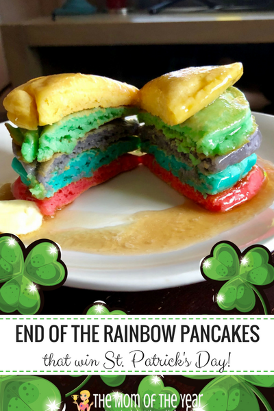 Looking for a perfect, easy St. Patrick's Day treat? These End of the Rainbow St. Patrick's Day Pancakes are a HUGE hit with the whole family--and so easy and fun! The perfect breakfast treat!