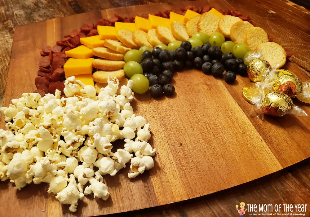 These kid-friendly St. Patrick's Day charcuterie boards are such a fun way to celebrate the holiday with a little magical fun! I would never have though of this idea for the end of the rainbow leprechaun's pot of gold! How creative and cute!