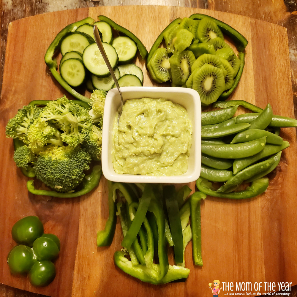 These kid-friendly St. Patrick's Day charcuterie boards are such a fun way to celebrate the holiday with a little magical fun! I would never have though of this idea for the end of the rainbow leprechaun's pot of gold! How creative and cute!